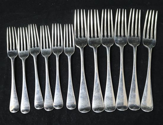 A set of six Victorian silver Old English pattern table forks and six dessert forks by George Adams, London, 1872, 23 oz.